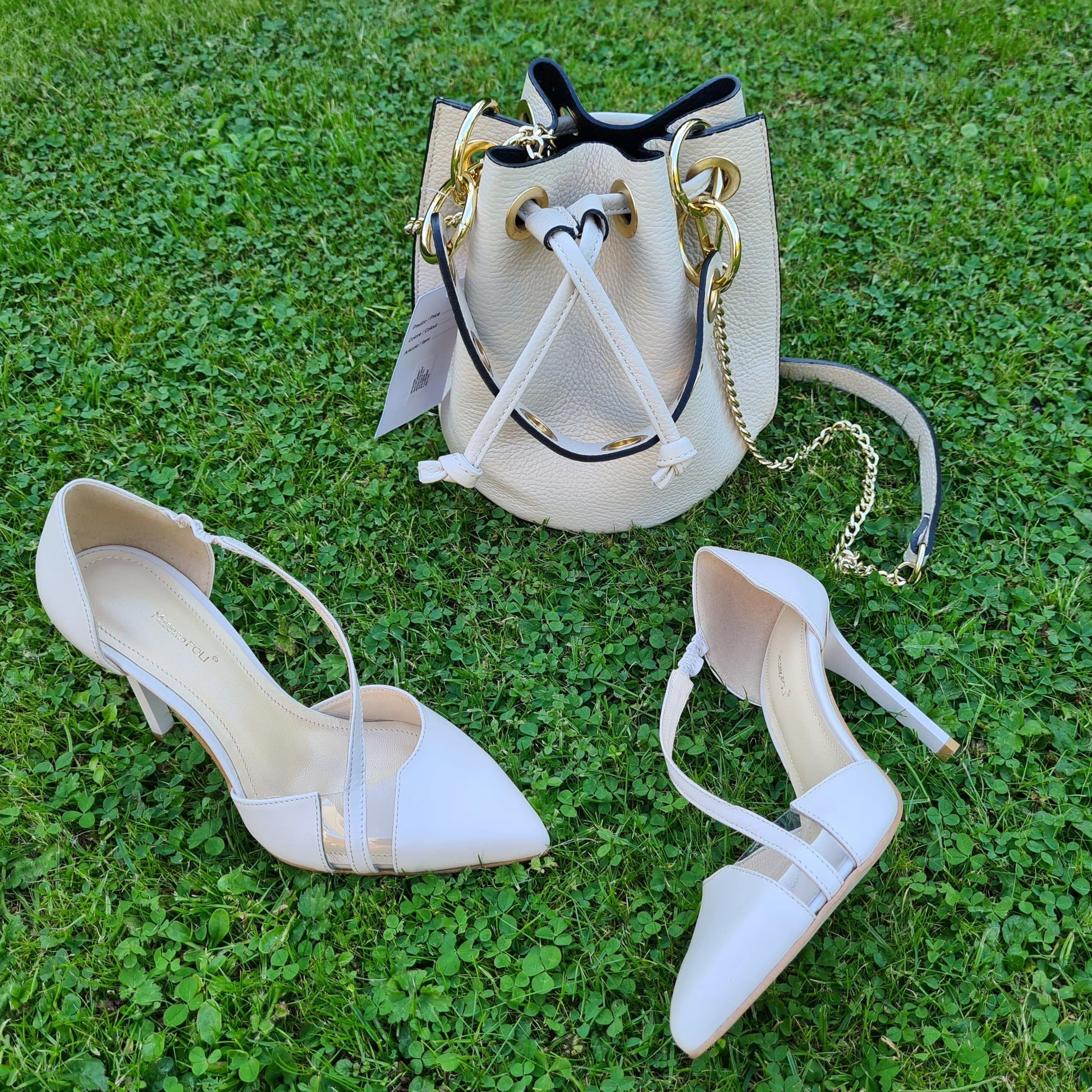 Nude leather bucket bag and a matching pair of nude leather court shoes