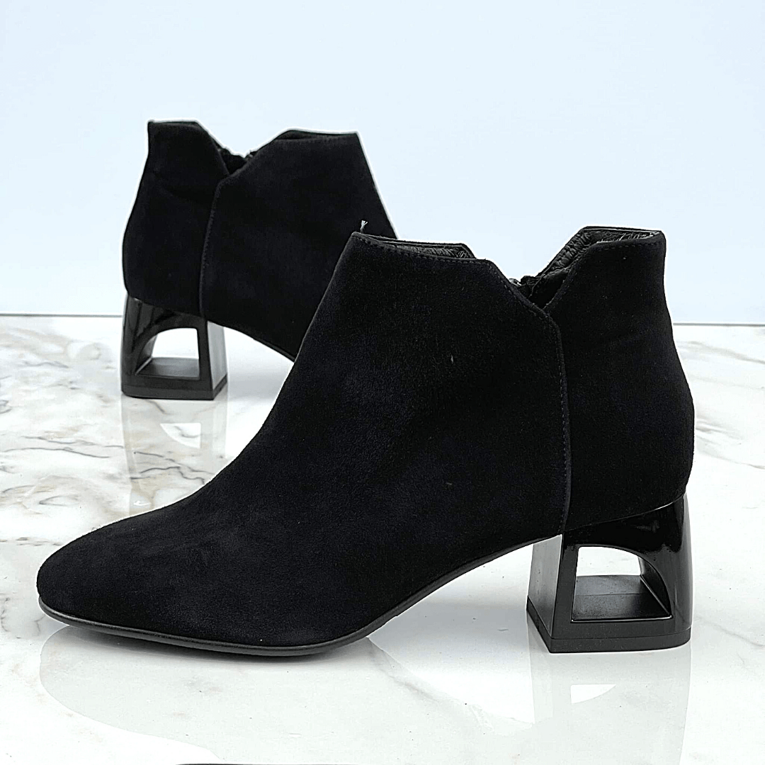 Black suede block heel ankle boots.