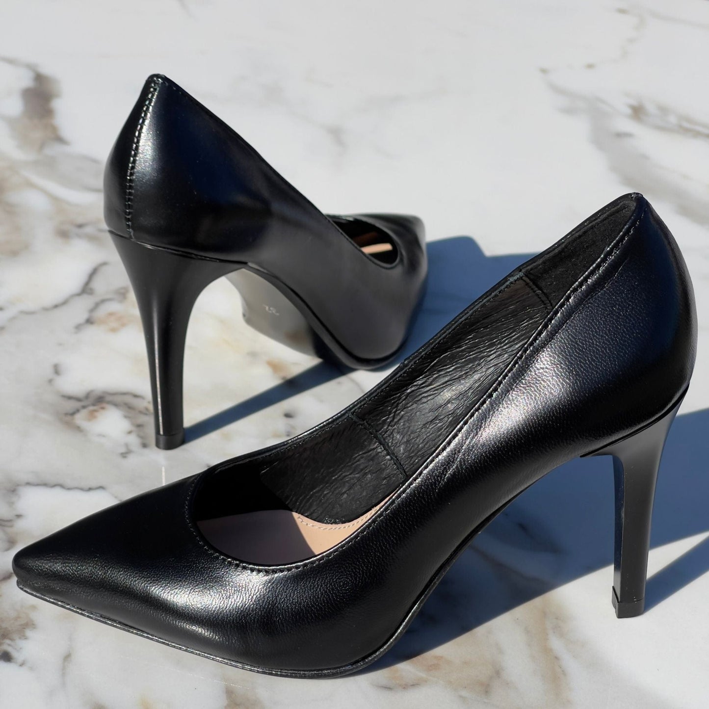 Small size black leather court heels