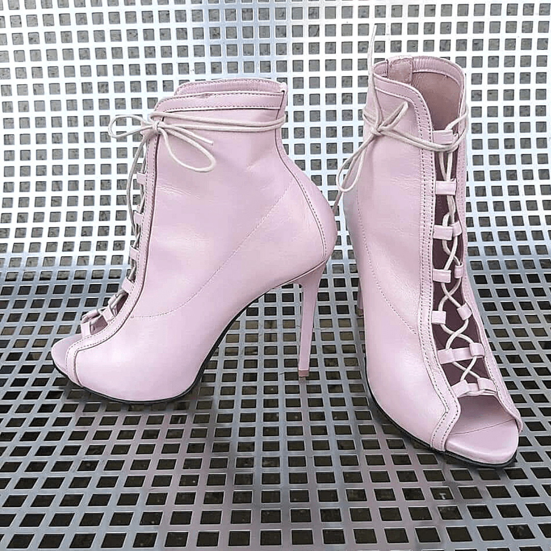 Pink leather tie up boots