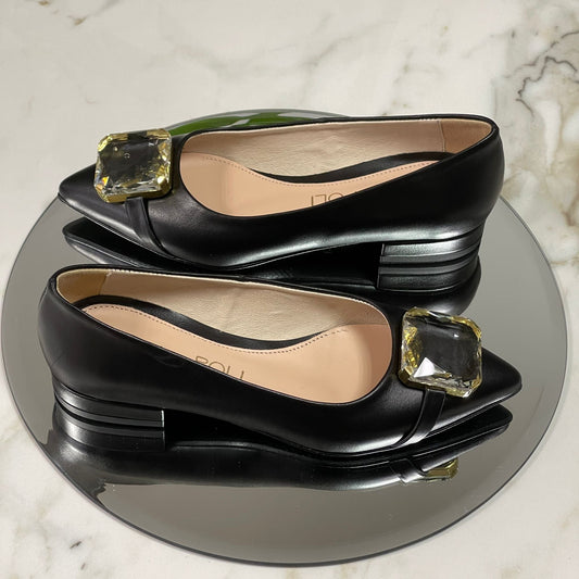 Pointed toe black leather ballerina shoes adorned with a crystal