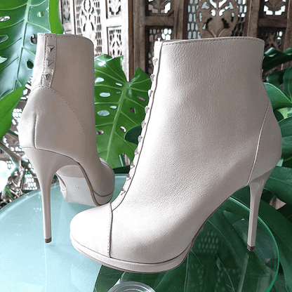 High stiletto boots in ivory leather