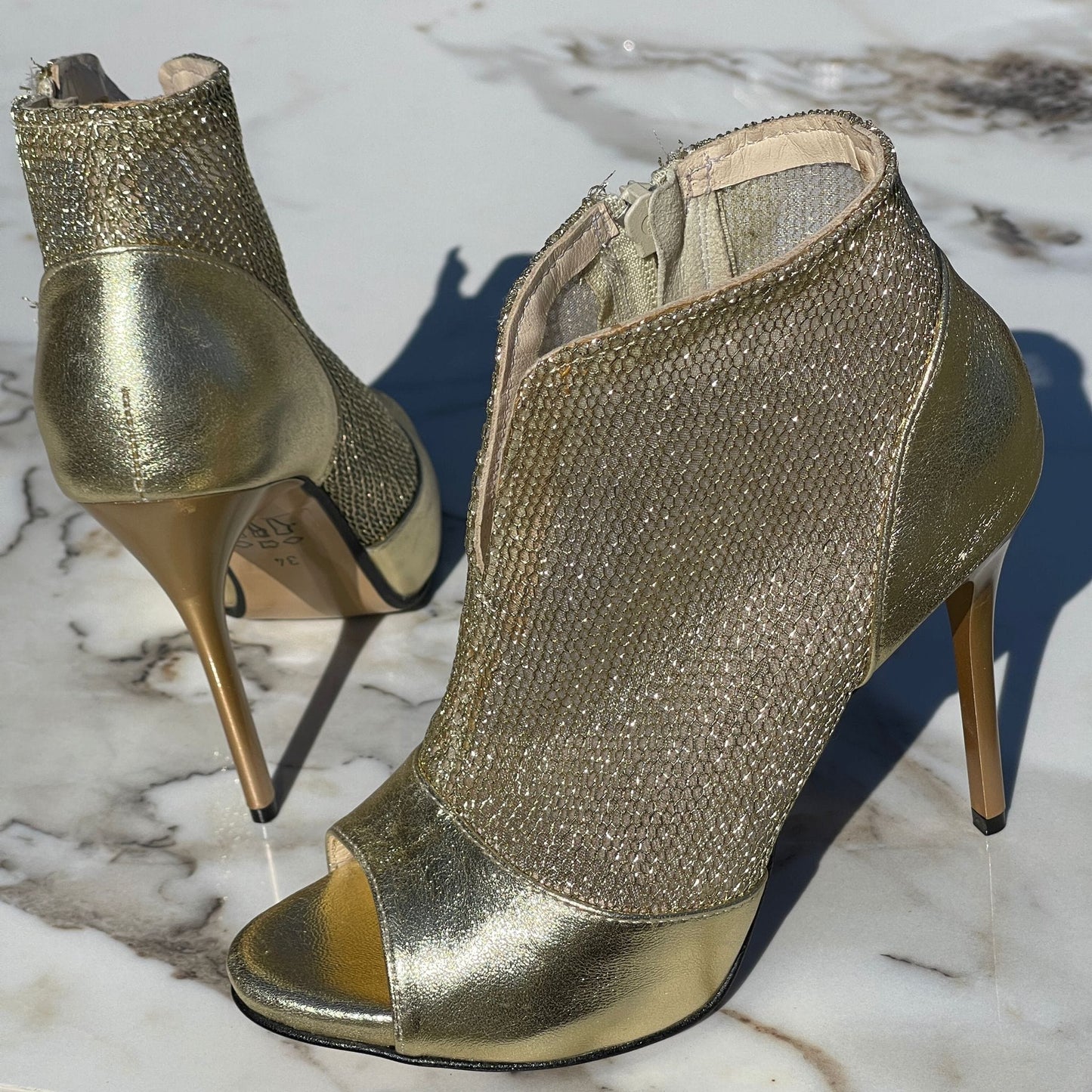 Small size ladies ankle boots in gold leather 