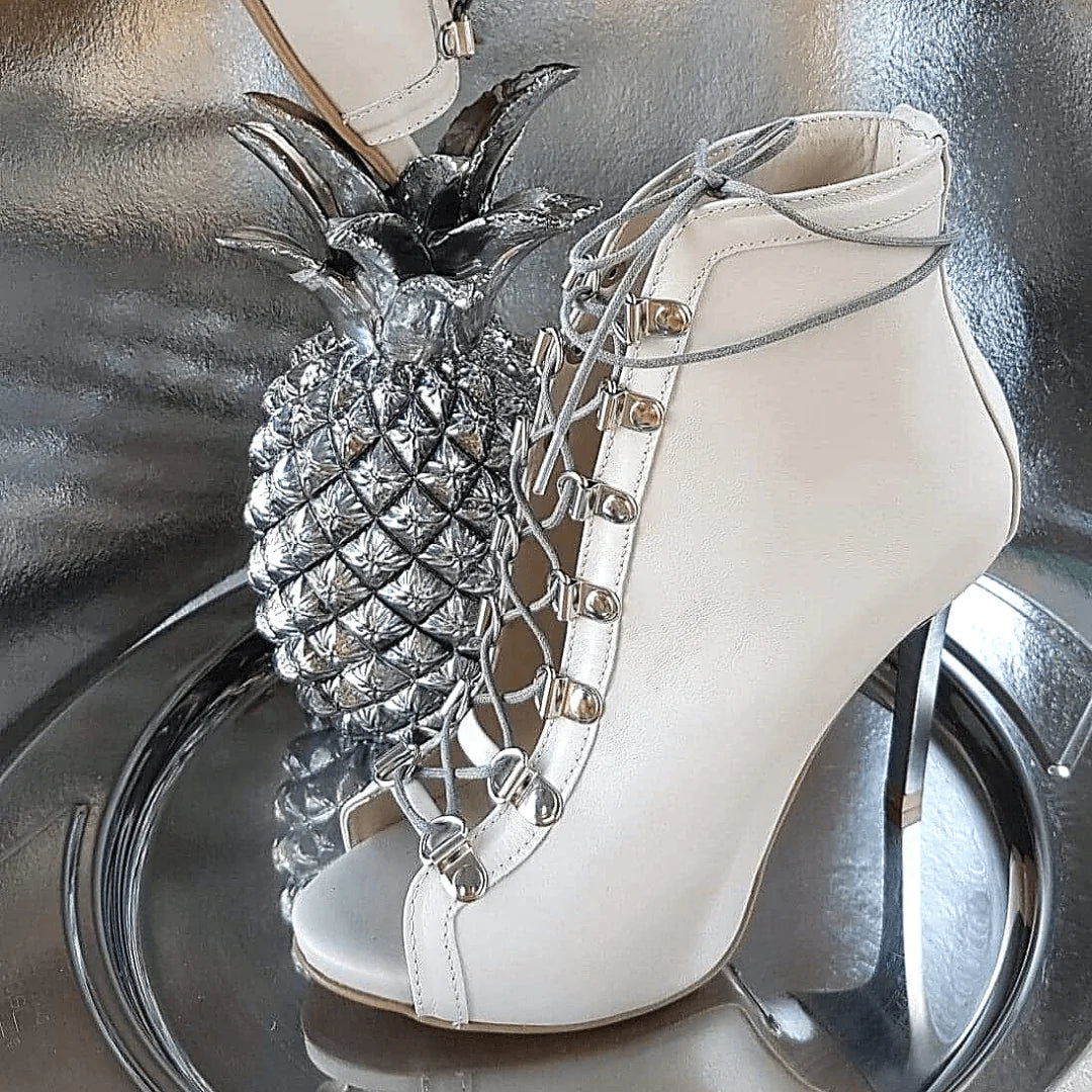 High heel hidden platform lace up boots in white leather