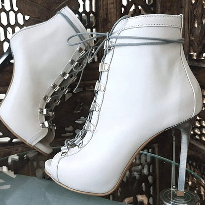 Open toe tie up ankle boots in white leather