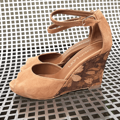 Tan suede sandals set on a cork wedge 