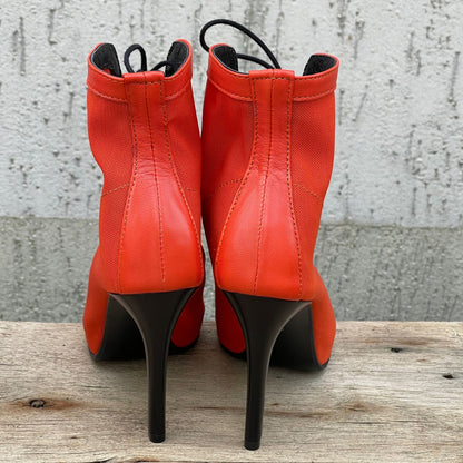 High heel gladiator boots in orange