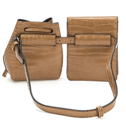 Two brown bags set on a belt.