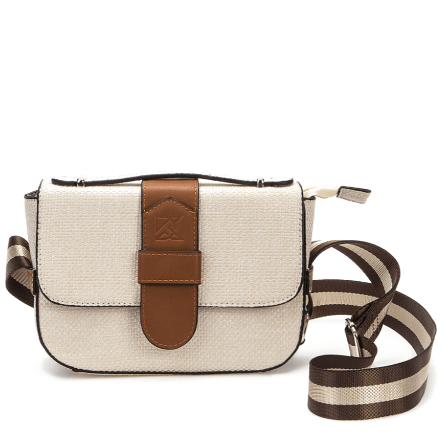 Woman's cross body bag in cream canvas with a brown strap.