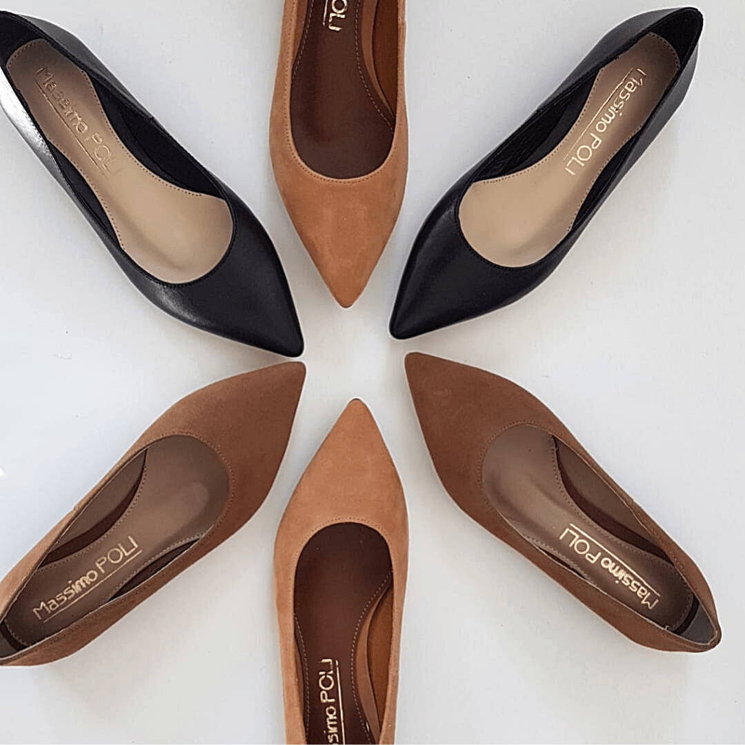 Collection of pointed toe ballerina shoes in black tan and brown colours