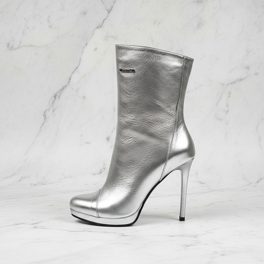 Side profile of VALERIE silver leather boot featuring designer silver logo and 1cm platform.